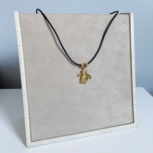 Gold tone Penguin Leather String Necklace